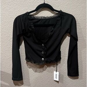 Woman’s black Cider long sleeve button up with tulle accent size small. NWT